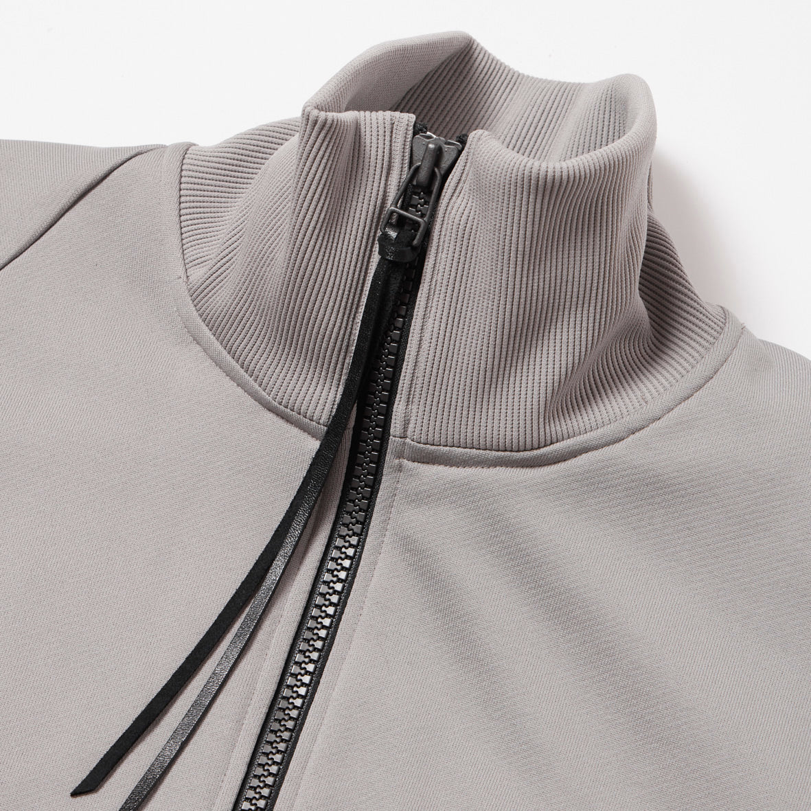 TWIST ZIP UP JERSEY